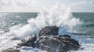 waves breaking over a pier