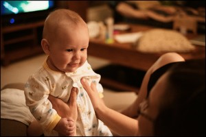 mother holding a baby